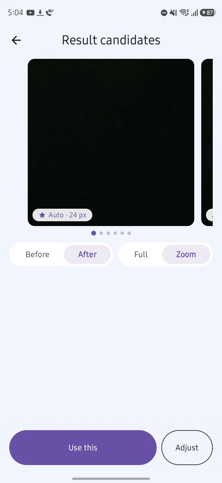 Result candidates zoomed in on the watermark area after removal: the dark background is clean where the logo was.